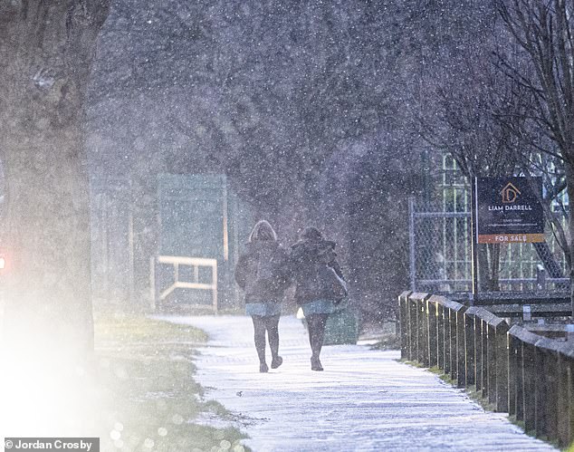 Snow in Scarborough in North Yorkshire as pedestrians battled icy conditions during the cold snap