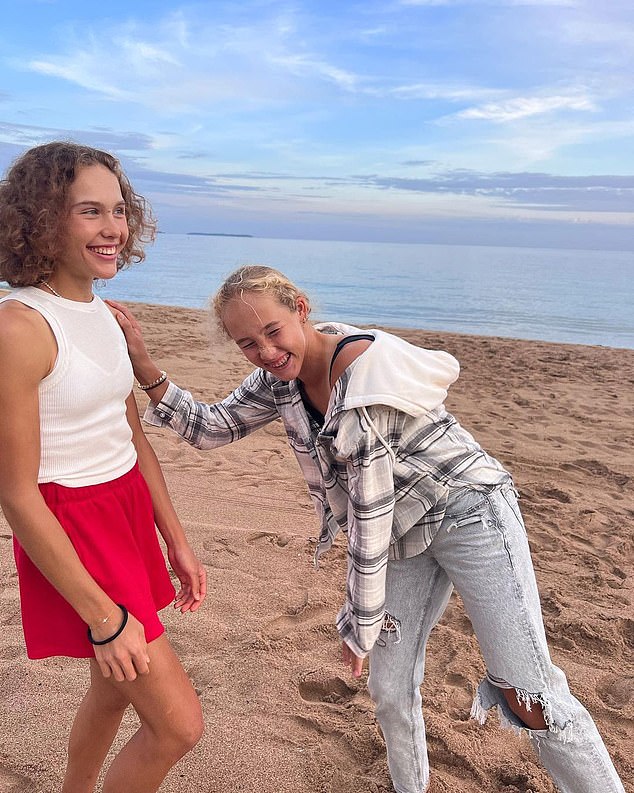 The cheerful teen, pictured next to her older sister Erika, keeps her feet on the ground