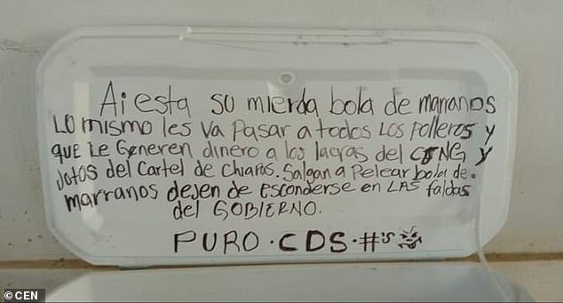 The message read: 'There's your bunch of pigs.  The same thing is going to happen to all the polleros (smugglers) who generate money for the scourges of the CJNG and the f*****s of the Chiapas Cartel.  “Go out and fight you bunch of pigs, stop hiding under the government's skirts.  Pure CDs'