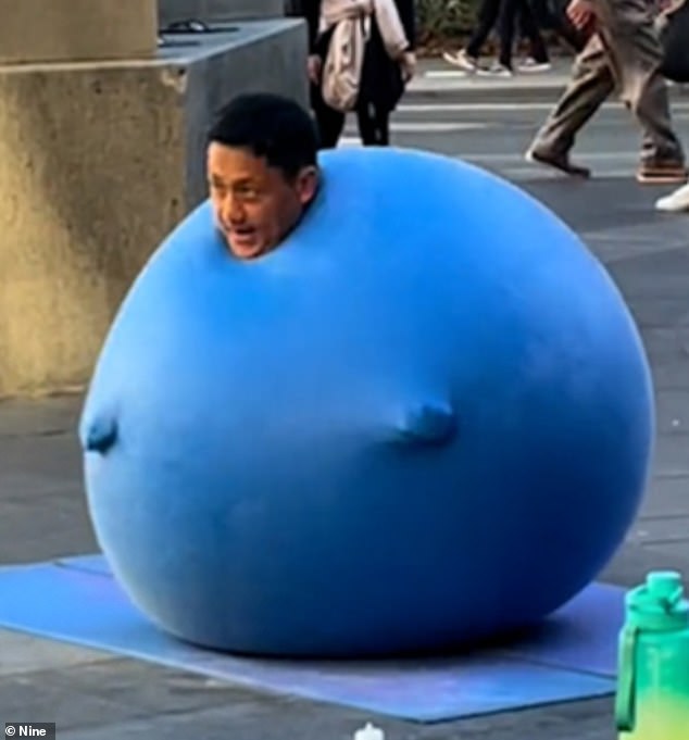 Mr Huang is remembered for his street performances dancing in a giant balloon in Sydney's CBD