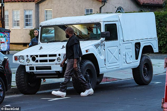 The couple was spotted outside their huge Toyota Mega Cruiser