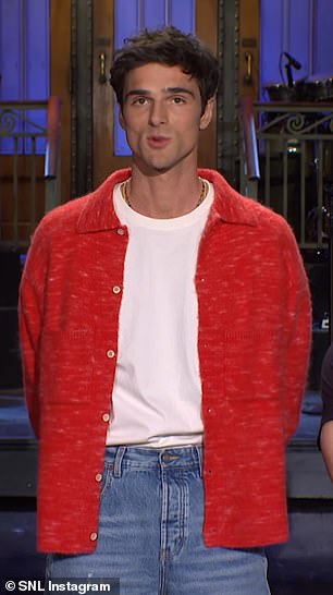 “Hello, I'm Jacob Elordi, and I'm hosting SNL Renee Rapp this week,” he addressed the camera while wearing jeans, a white shirt and a warm red cardigan