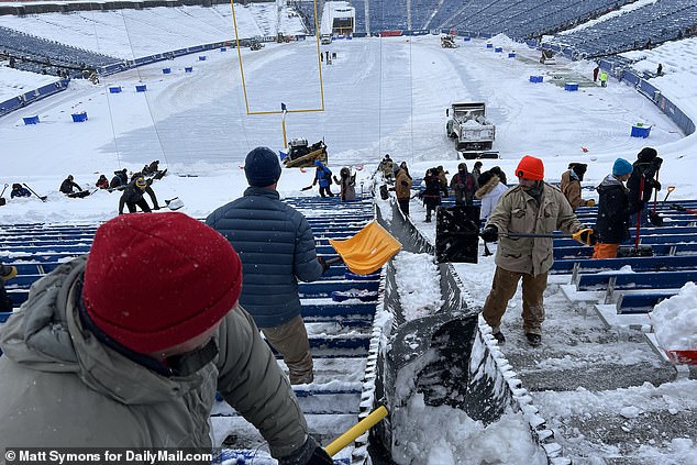 Volunteers receive free hot drinks and $20/hour for their help clearing the stadium bleachers