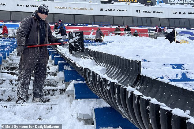 Several inches of snow can be seen between the rows of stands as fans worked tirelessly to clear the stadium in time for this weekend's AFC Divisional round.