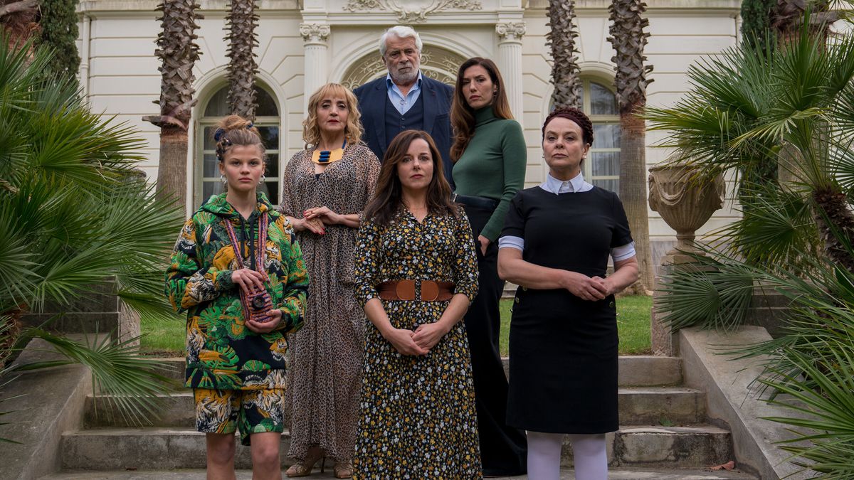 (L-R, top to bottom) Laure Calamy, center, with, clockwise from left, Céleste Brunnquell, Dominique Blanc, Jacques Weber, Doria Tillier and Véronique Ruggia Saura in “The Origin of Evil.”  Credit…Laurent Champoussin/IFC Films