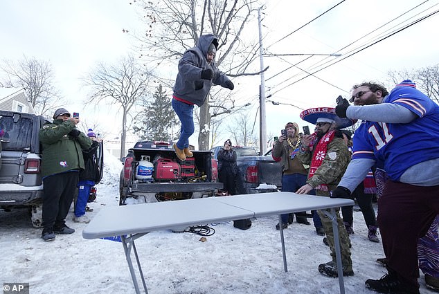 Buffalo Bills fans have become famous for jumping through tables during their tailgates