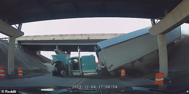 He was sent off an overpass, police said later - and is seen sliding down a slope and onto the road where the driver drives down at high speed