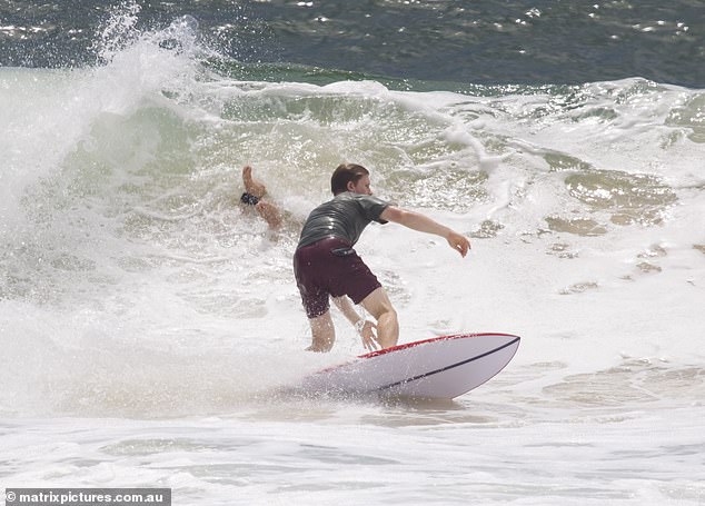 As Chandler was swept off his board, Robert circled around to catch the wave.  But he paid the price for his ostentation