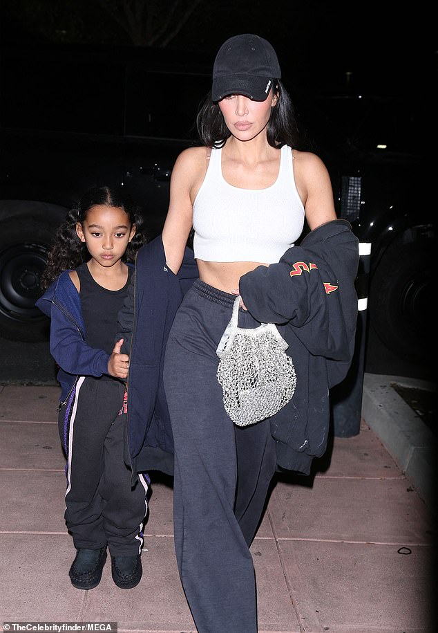 Kim was spotted arriving at her son's basketball game with Chicago next to her