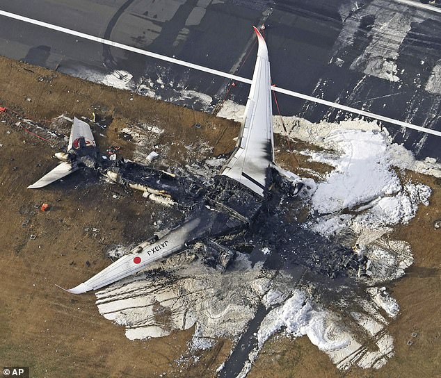 This aerial photo shows the burned out remains of Japan Airlines Flight 516