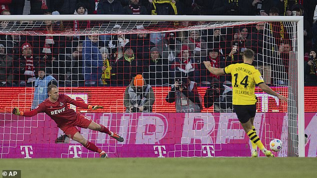 Fullkrug converted the resulting penalty to give Dortmund a 2-0 lead against Cologne