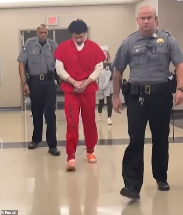 Cook is seen entering a Cleveland County courthouse last month for a preliminary hearing as he faces trial for Bills' rape and murder