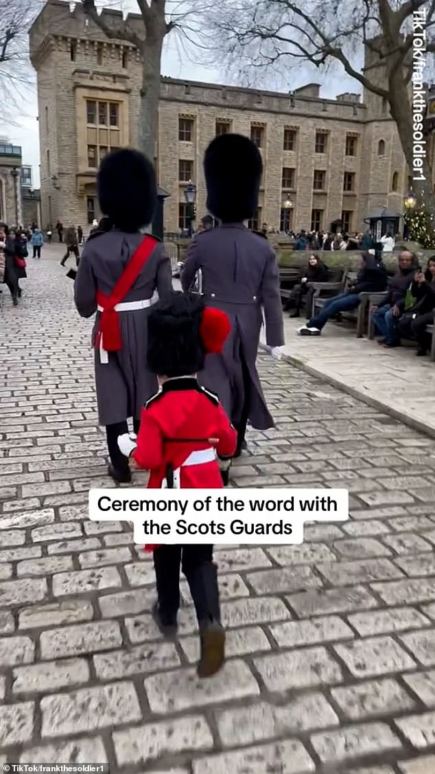 The little boy chased the guards but struggled to keep up as they marched through the Tower of London