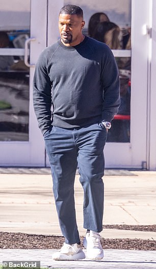 The Oscar winner kept it casual by wearing a black long-sleeved sweater and dark blue pants