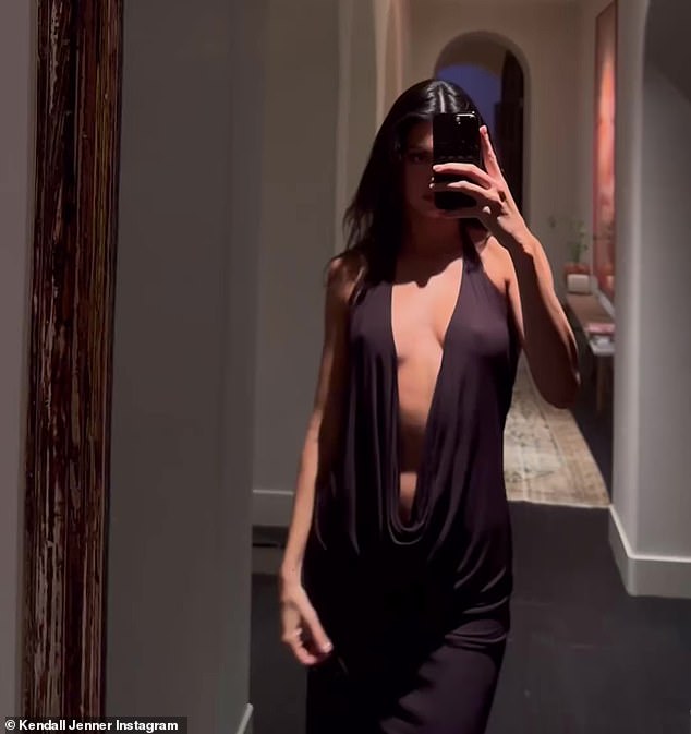 The reality star - who hit the slopes with sisters Kim and Khloé Kardashian - posted a video on her Instagram of herself wearing a breathtaking black dress