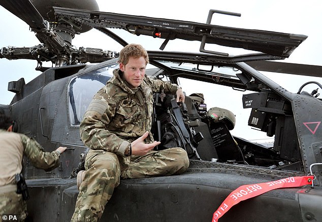 Harry can be seen as a helicopter pilot in Afghanistan in December 2012