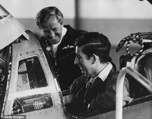 The then Prince of Wales, being briefed by Wing Commander 'Hank' Martin, Commanding Officer No. 43 Squadron, before his flight in a Phantom Interceptor in 1971