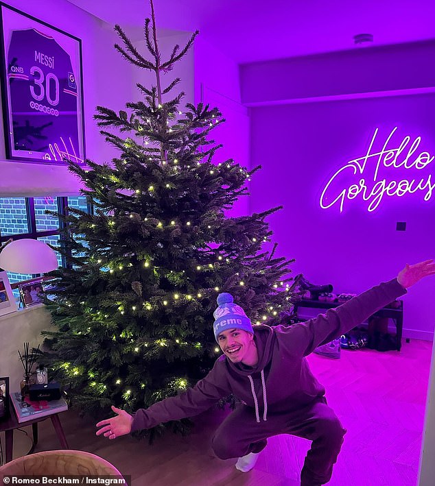 In another photo taken at Christmas, Romeo gave fans a sneaky look at the couple's living room as he posed next to their huge Christmas tree.