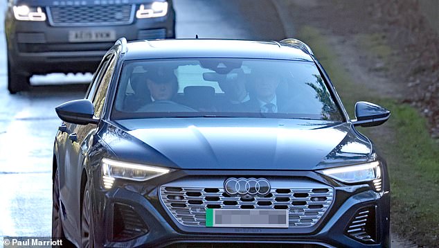 The King and Queen Camilla, in the backseat, arrive at Sandringham