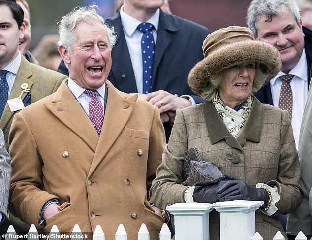 It's Ascot, but on this occasion the royal couple were seen jumping over fences as part of an event called 'The Lamb National', organized by the Campaign for Wool.  A smile?  Ewe bet