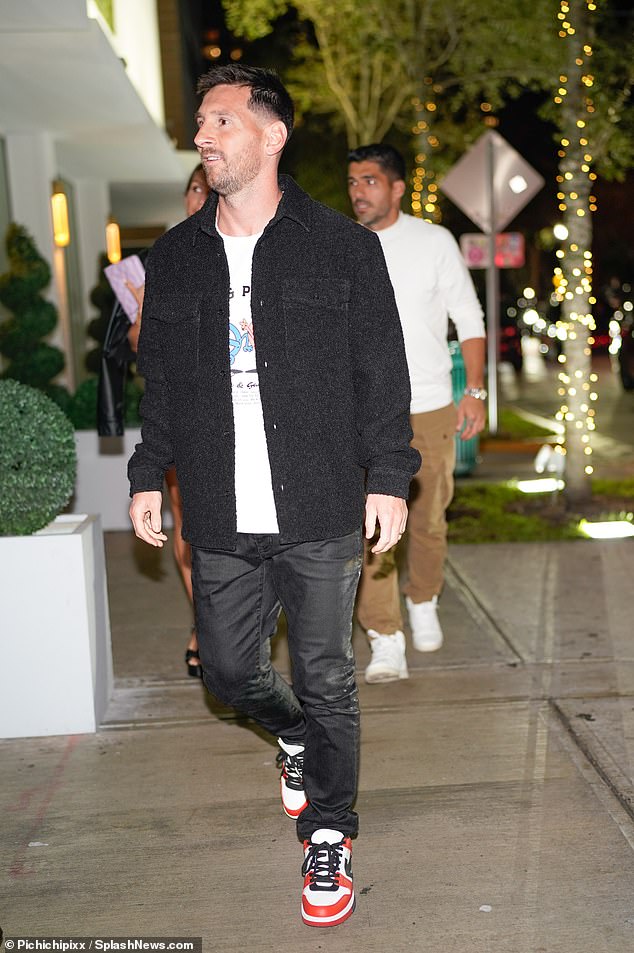 Meanwhile, Messi looked effortlessly cool in a white T-shirt and an open black shirt which he paired with black trousers and white Nike sneakers