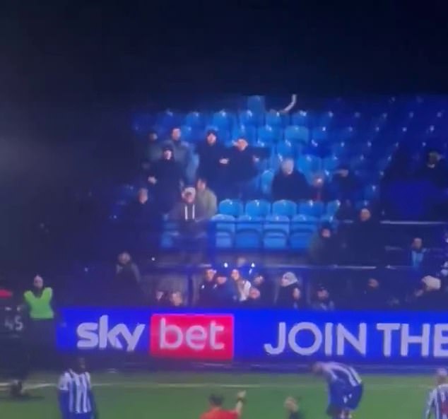 The footage shows a group of Sheffield Wednesday fans making monkey gestures