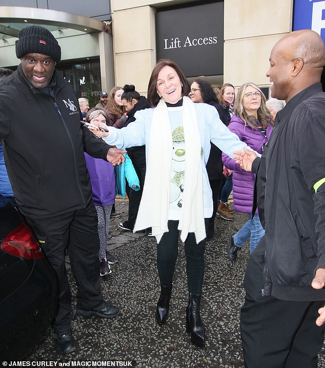 Judge Shirley Ballas showed off her natural beauty as she left the hotel makeup-free in a snowman sweater with skinny jeans