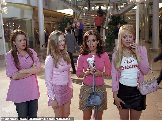 Four Mean Girls protagonists stand in the Old Orchard Mall.  The film was released in 2004