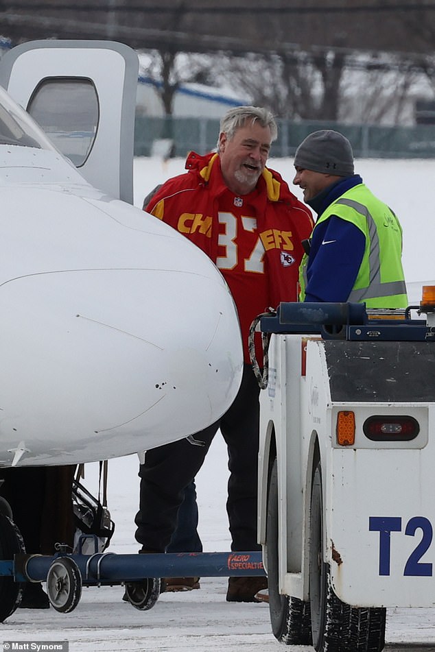 Ed Kelce is pictured wearing his son Travis' number 87 under a Kansas City Chiefs jacket