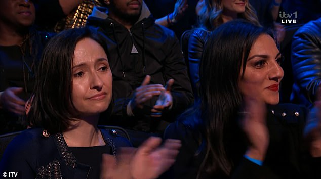 Adele's friend Kate Holderness (pictured left) was in tears as she and others gave the couple a standing ovation