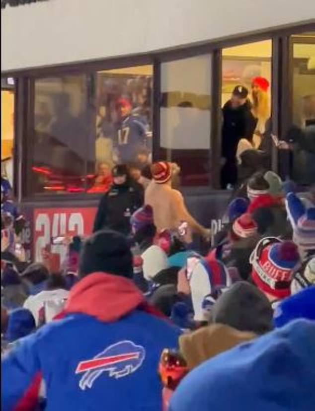 Jason then drank a beer in front of the Bills fans before climbing back into the suite