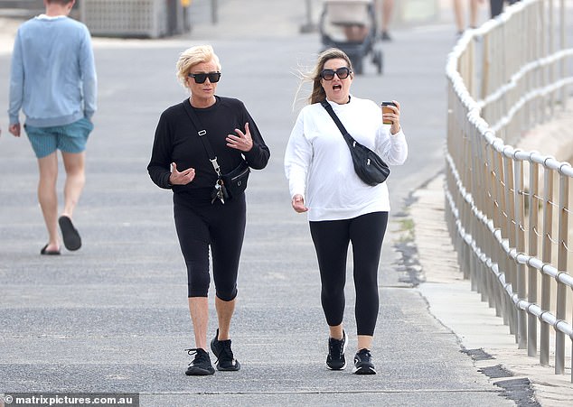 Deborra-Lee hid her eyes behind dark designer sunglasses, strapped a black bag over her torso and had a pair of comfortable sneakers on her feet.