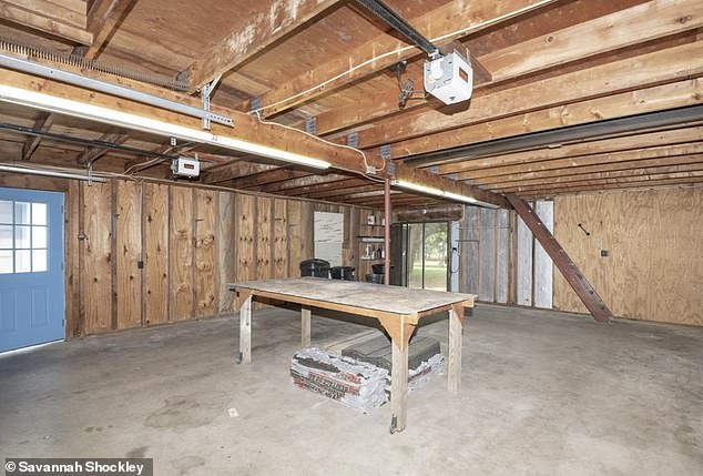 The garage stands as a separate structure next to the house that Savannah's parents recently purchased