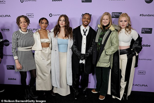 The 37-year-old filmmaker (L) proudly posed at the Suncoast premiere with Linney and four more members of the ensemble cast - (from L-R) Daniella Taylor, Baby Ariel, Amarr and Ella Anderson