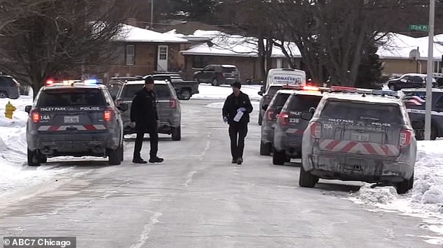 Police closed the street in Tinley Park, near Chicago, on Sunday