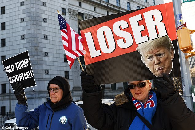 Trump was greeted by protesters amid speculation about whether he would take the stand