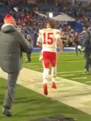 Mahomes is hit by a snowball from the crowd