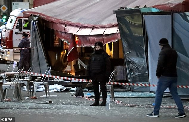 A view of the scene of a cafe explosion in St. Petersburg, Russia, Sunday