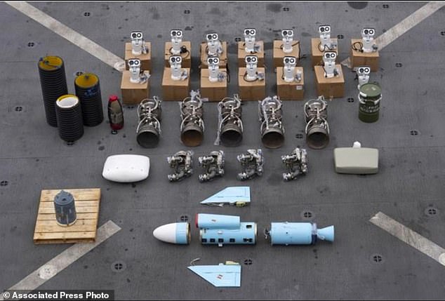 This undated photo released by the US military's Central Command shows what it describes as Iranian-made missile components en route to the Houthi in Yemen seized from a ship in the Arabian Sea