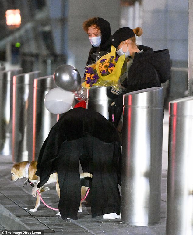 The duo also appeared to have several balloons waiting for them