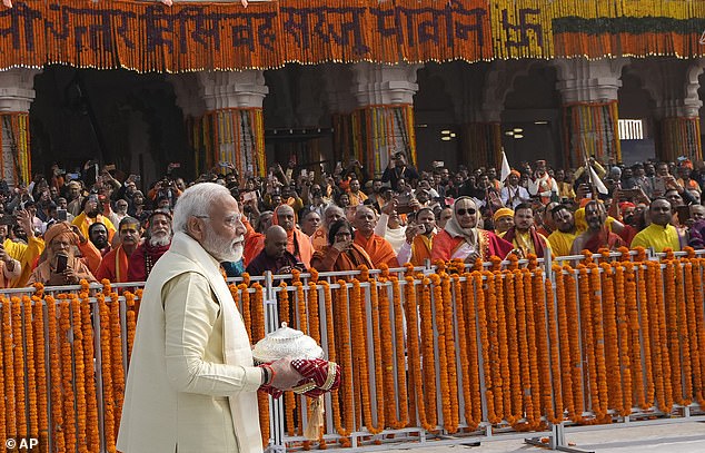 Indian Prime Minister Narendra Modi arrived to officiate the opening of a Hindu temple