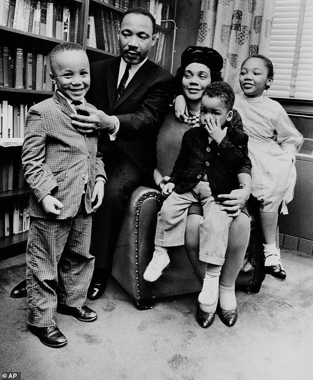 Dexter Scott King, pictured on mother Coretta's lap as a two-year-old, was just seven when his father was murdered in Memphis in 1968.