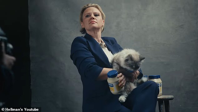 According to People, the 40-year-old artist was spotted during a photo shoot, where she was tasked with both holding a cat and displaying jars of mayonnaise for the camera.