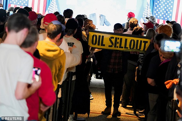 Trump's speech was briefly interrupted by a protester holding an 