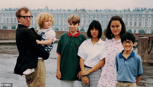 Allen is pictured holding daughter Dylan in a family photo.  Second from the right is Soon-Yi, whom he would marry when she was 21 and he was 56