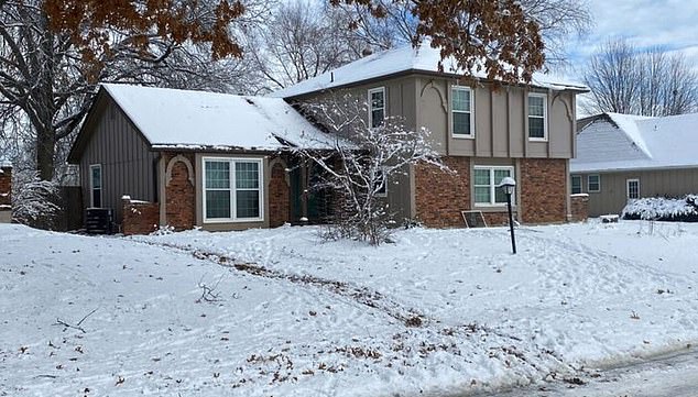 The owner of the house (pictured) told police that the men had frozen to death in his backyard.  Their loved ones have raised questions about the lack of coverage of their bodies, and the snow they say was not deep enough to submerge them