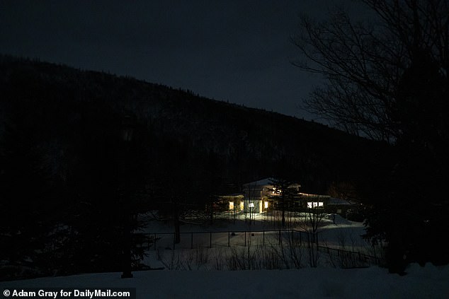 Voting for the town's six residents took place in the living room of the Tillotson House in The Balsams ski area in northern New Hampshire (photo just before midnight)