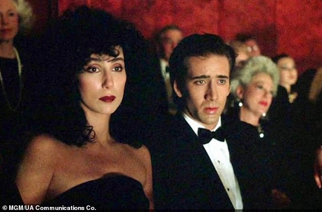 The half-Armenian SoCal native famously threatened to quit the romantic drama if Norman cast Peter Gallagher to play the one-handed baker instead of Nicolas Cage (R), who at 22 was 19 years her junior.