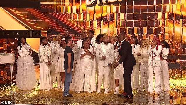 Simon took the stage and joined the choir after hitting his Golden Buzzer for the group