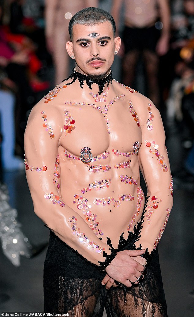 Many of the models have tops and bodysuits made to resemble naked bodies with jewels